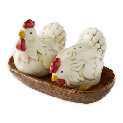 Two ceramic chicken salt and pepper shakers in a basket-shaped tray