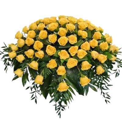 Yellow rose casket spray with cascading greenery