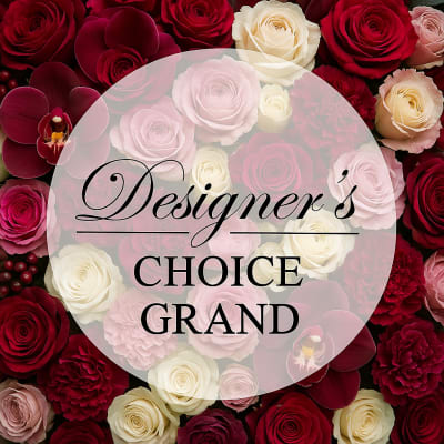 Assorted roses and orchids with a "Designer’s Choice Grand" label