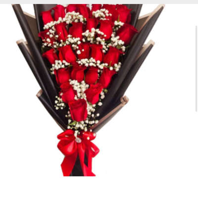 Bouquet of red roses with baby's breath and a red ribbon