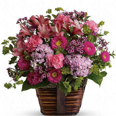 Pink and purple mixed flower basket with carnations and alstroemeria in a brown wicker container