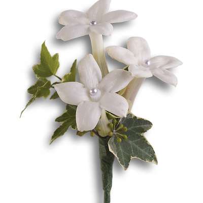 Small white boutonniere with three star-shaped blooms and pearl centers