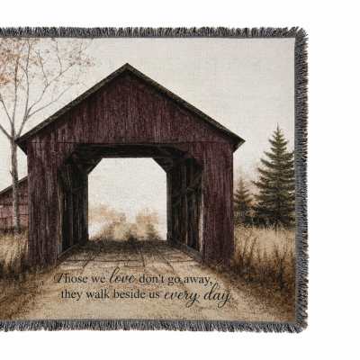 Fringed memorial throw blanket with a covered bridge scene and printed quote