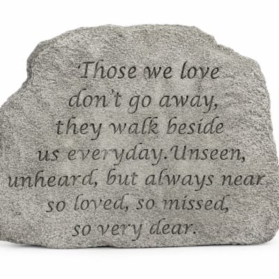 Gray memorial stone with an engraved sympathy message