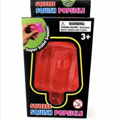 Red popsicle-shaped squishy toy in retail packaging