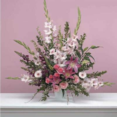 Pink and white mixed flower arrangement in a vase