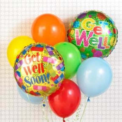 Cluster of colorful balloons with two printed get-well messages