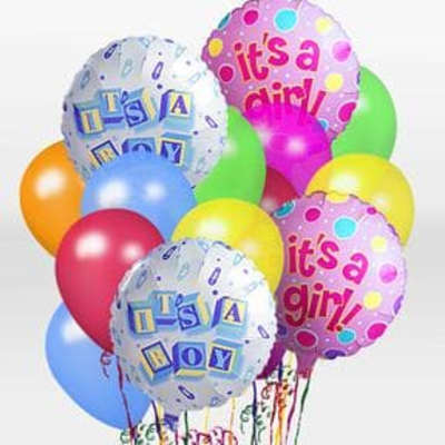 Cluster of colorful balloons, including two that say "It's a boy" and two that say "It's a girl".