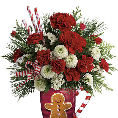 Red and white floral arrangement in a red vase with candy cane accents