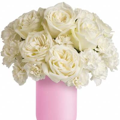 White roses and carnations in a pink vase