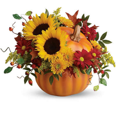 Pumpkin-shaped floral arrangement with sunflowers and autumn blooms