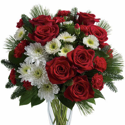 Red roses and white chrysanthemums in a clear glass vase