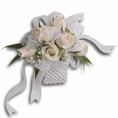 White rose corsage with ribbon and pearl accents
