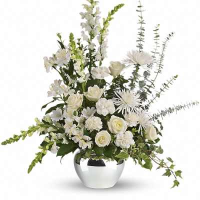 White floral arrangement in a silver vase with roses and tall spikes