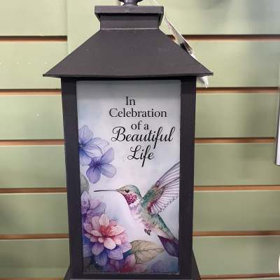 Black lantern with a hummingbird and floral memorial message