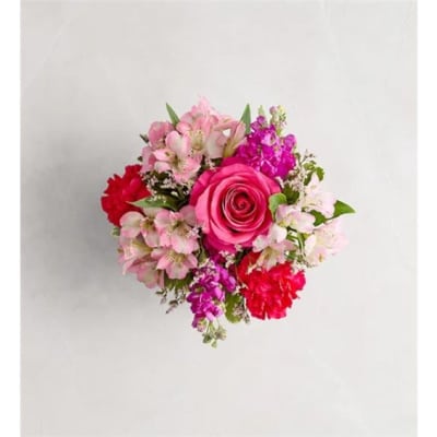 Pink rose bouquet with mixed pink and red flowers