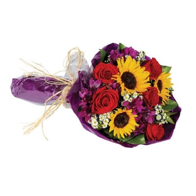 Bouquet of red roses and yellow sunflowers wrapped in purple paper