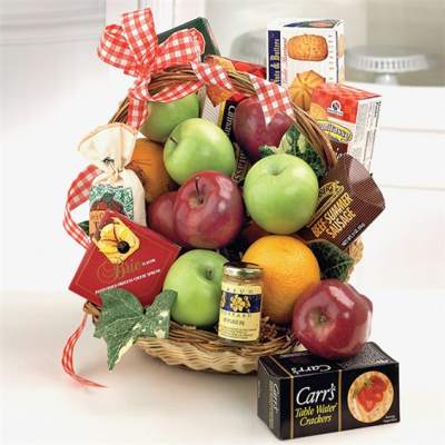 Basket of fruit and packaged snacks tied with a red gingham ribbon