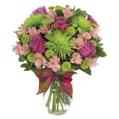 Bouquet of pink roses and green chrysanthemums in a glass vase