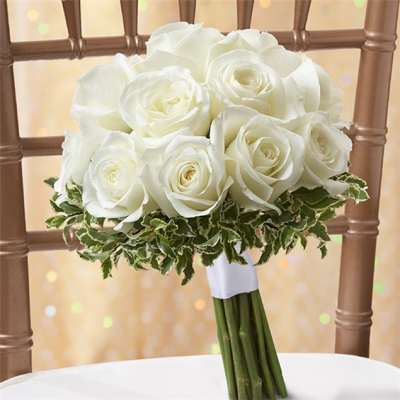 White rose bridal bouquet with variegated greenery