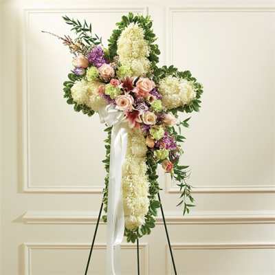 Cross-shaped floral standing spray with white, pink, and purple flowers
