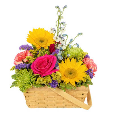 Basket of mixed flowers with sunflowers and a pink rose