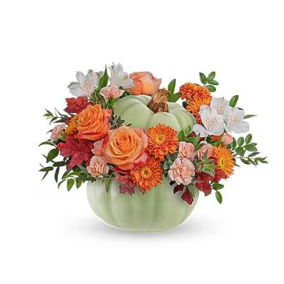 Pumpkin-shaped vase with orange and white flowers