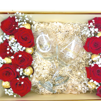 Gift box with red roses, baby’s breath, and two etched wine glasses