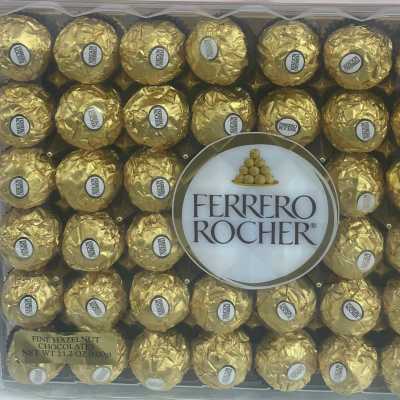 Large box of Ferrero Rocher hazelnut chocolates in gold foil wrappers