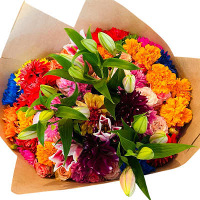 Colorful mixed bouquet wrapped in brown paper with lily buds and assorted blooms