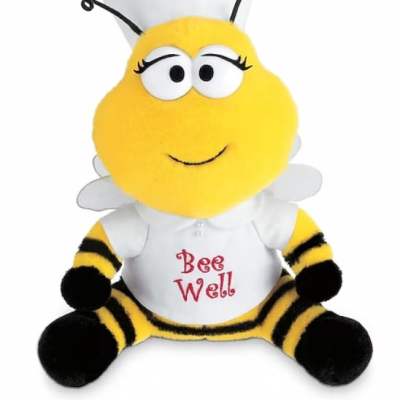 Plush bee toy wearing a white shirt with "Bee Well" text