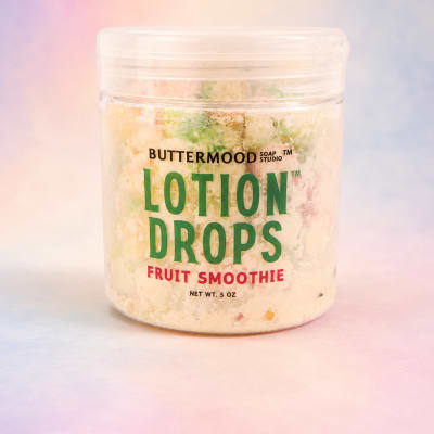 Jar of lotion drops with fruit smoothie label
