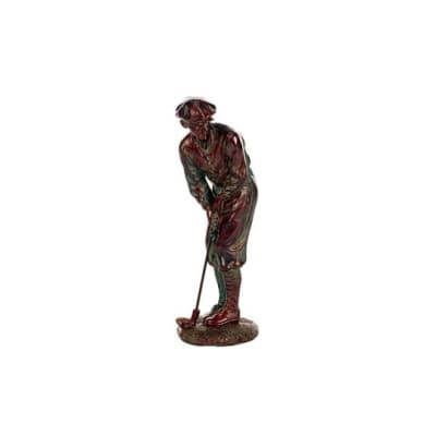 Small metallic figurine of a vintage golfer in a putting stance on a round base