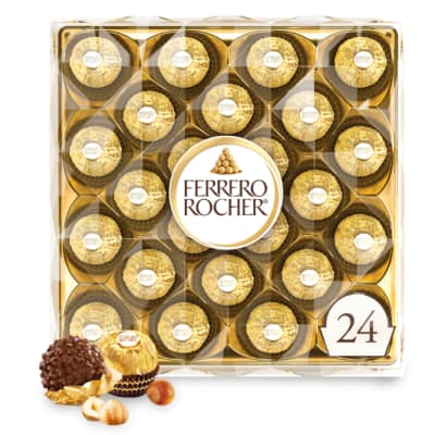 Box of Ferrero Rocher chocolates with two loose chocolates in front