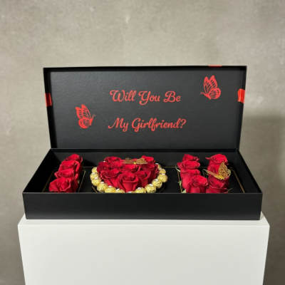 Black gift box with red roses and a "Will You Be My Girlfriend?" message