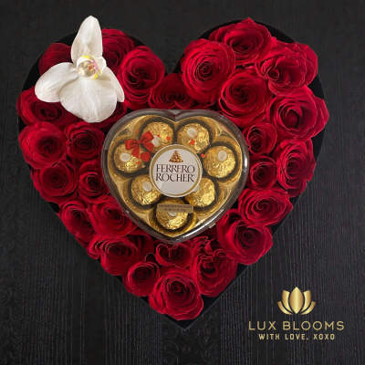 Heart-shaped rose arrangement with a Ferrero Rocher box and white orchid