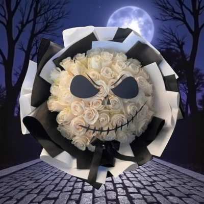 White rose bouquet styled like a skull with black-and-white wrapping