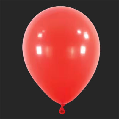 Single red balloon on a dark background