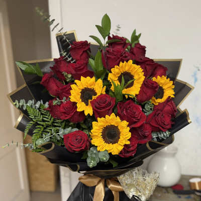 24 red roses and 4 sunflowers