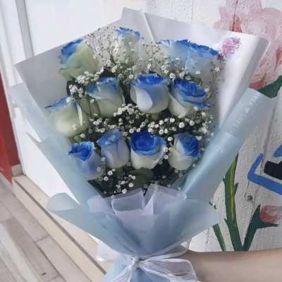 Bouquet with 12 roses in light blue