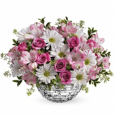 Pink roses and white daisies in a silver basket