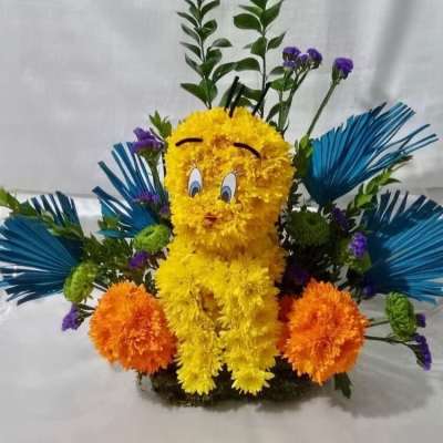 Yellow floral character arrangement with blue and orange accents