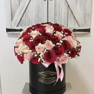 Romance in Bloom” Rose Hatbox Arrangement