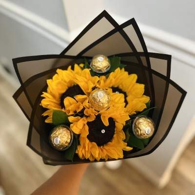 Sunflower bouquet with Ferrero Rocher chocolates in black wrap