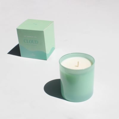 Mint green candle in a glass jar with matching box
