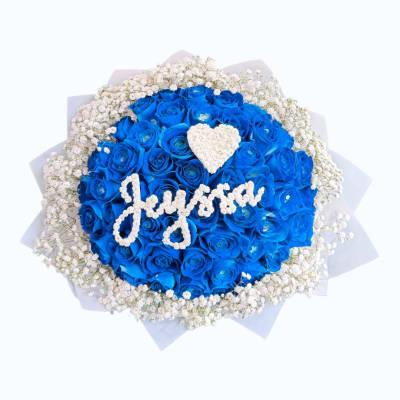 Blue rose bouquet with white baby's breath and a heart accent