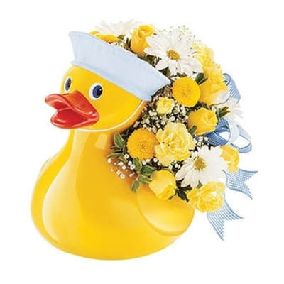 Yellow duck-shaped container filled with yellow and white flowers