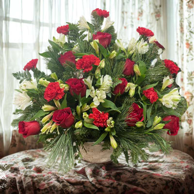 Red roses and white lilies in a basket arrangement