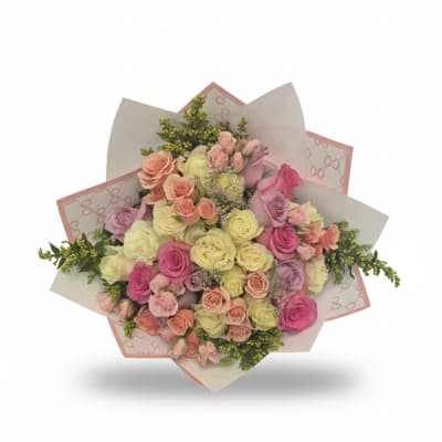 Bouquet of pastel roses wrapped in pink and white paper