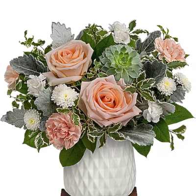 Peach roses and white daisies in a white vase with succulents